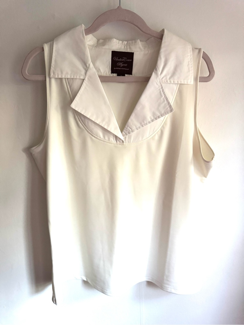 Under Cover Agent. White Sleeveless Collared Top by Kathleen Kirkwood
